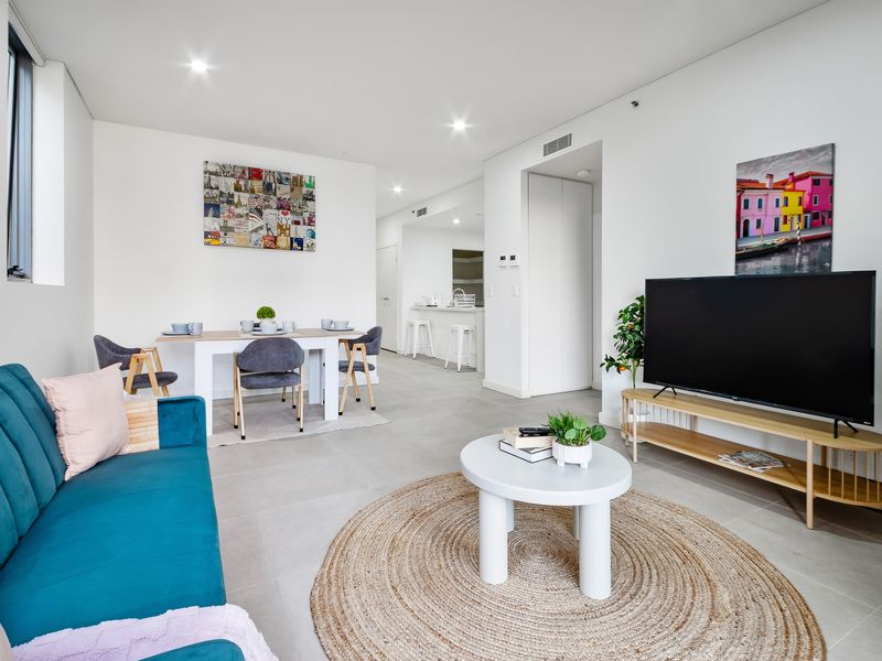 Spacious open-plan layout connecting dining and kitchen.