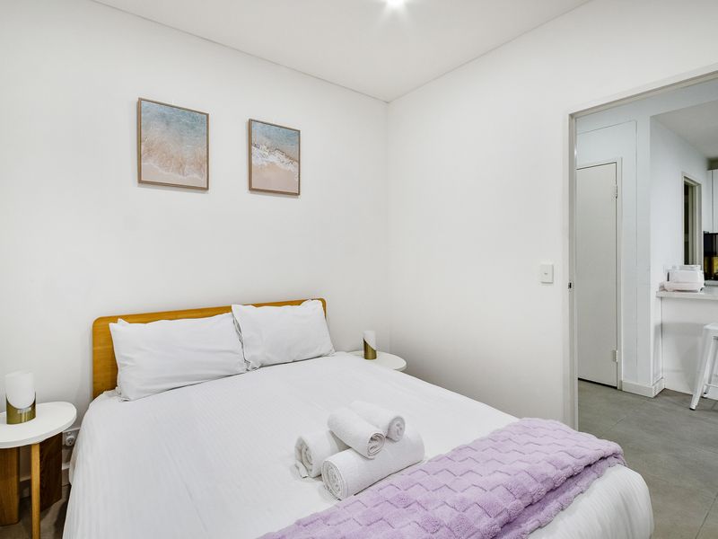 Light-filled bedroom with soft décor.