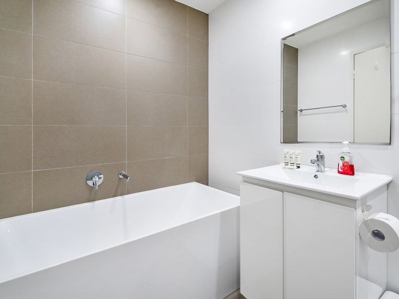 Sleek bathroom with modern fixtures.