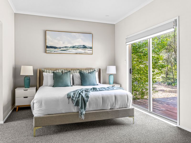 Wake up refreshed in this bright bedroom.
