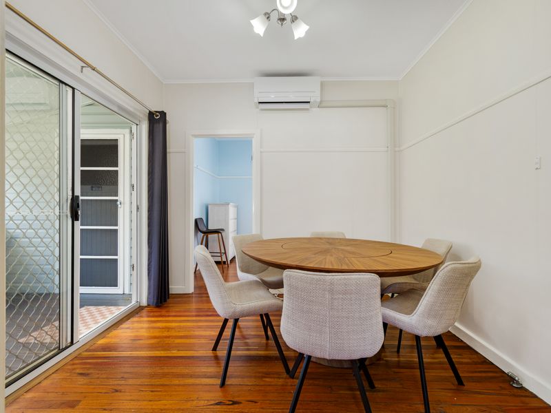 Cosy dining space with natural light and comfortable seating.