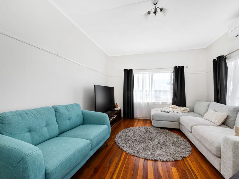 Comfortable living space with modern furnishings and homely charm.