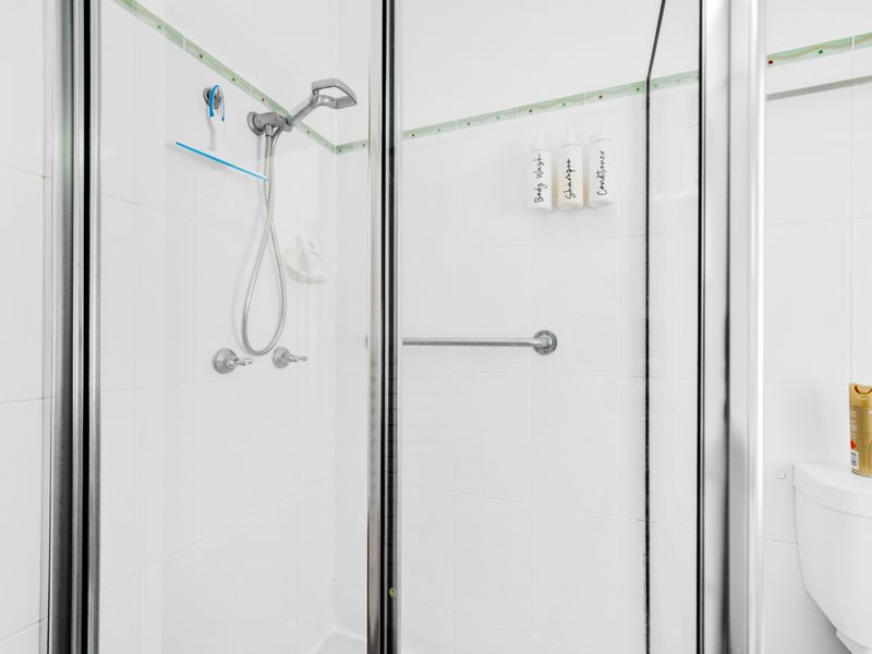 Neat and practical bathroom for guest comfort