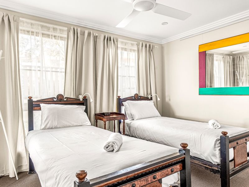 Bright and airy bedrooms offering both comfort and privacy.