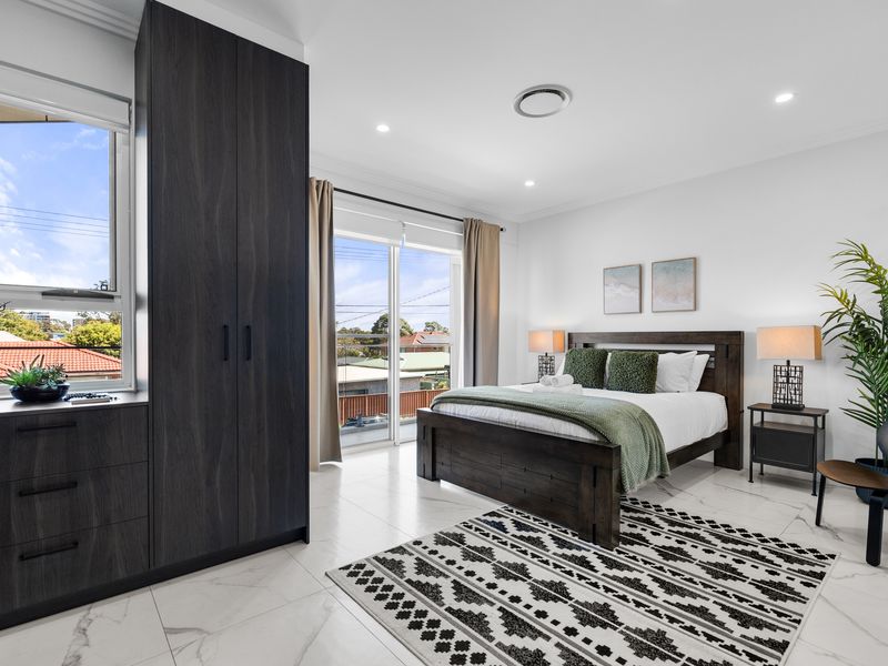 Drift into comfort in the spacious bedroom.