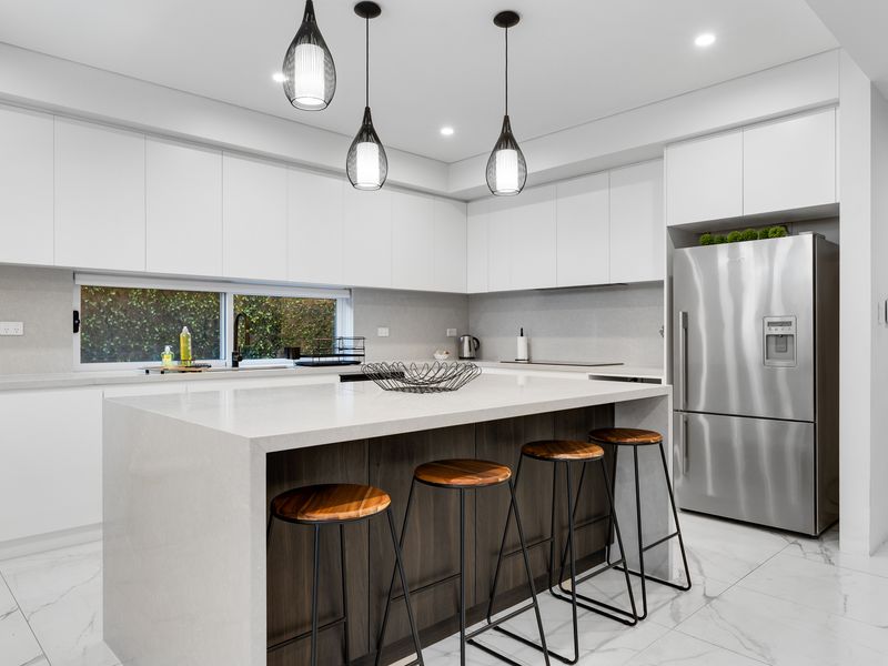 Bright kitchen with bar-style seating