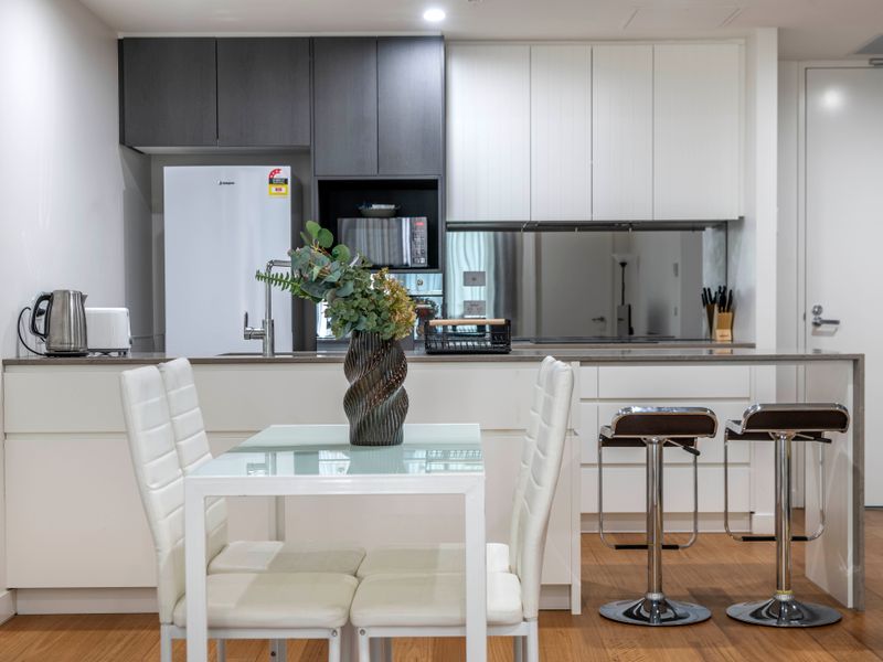 Modern kitchen with breakfast bar and ample storage space
