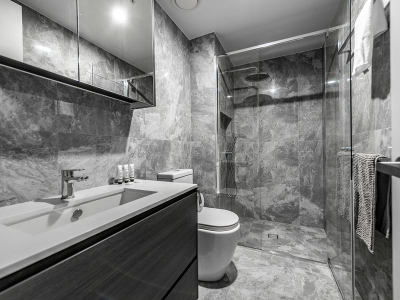 Stylish bathroom with premium finishes and walk-in shower