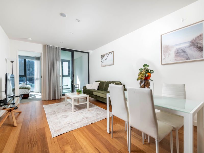 Open-plan layout with lounge and dining area filled with natural light