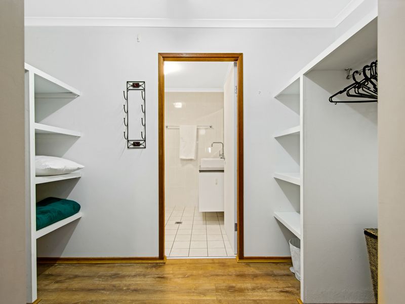 Spacious wardrobe with ample storage for a comfortable stay.