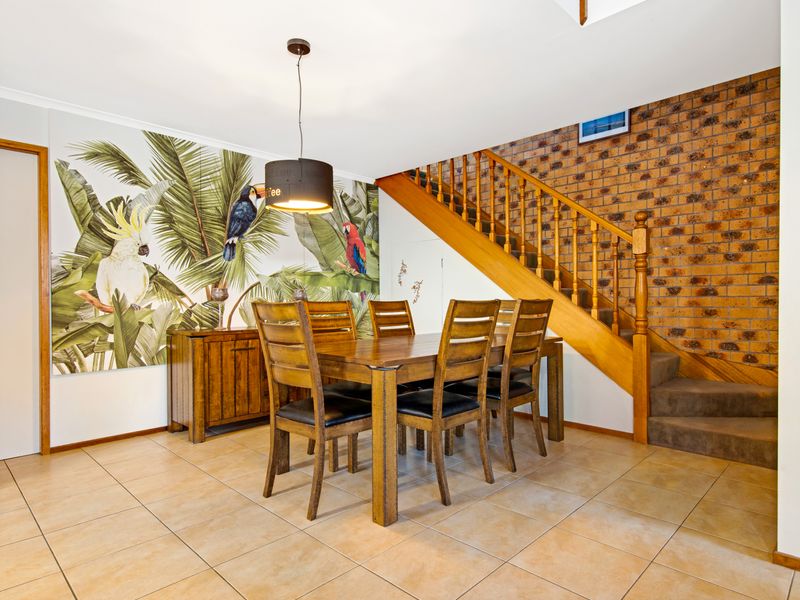 Bright and inviting dining space ideal for family gatherings.
