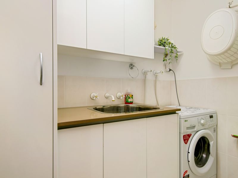 Convenient laundry space available for guest use.