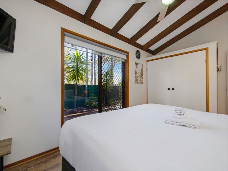Bright and airy bedroom offering a peaceful escape.