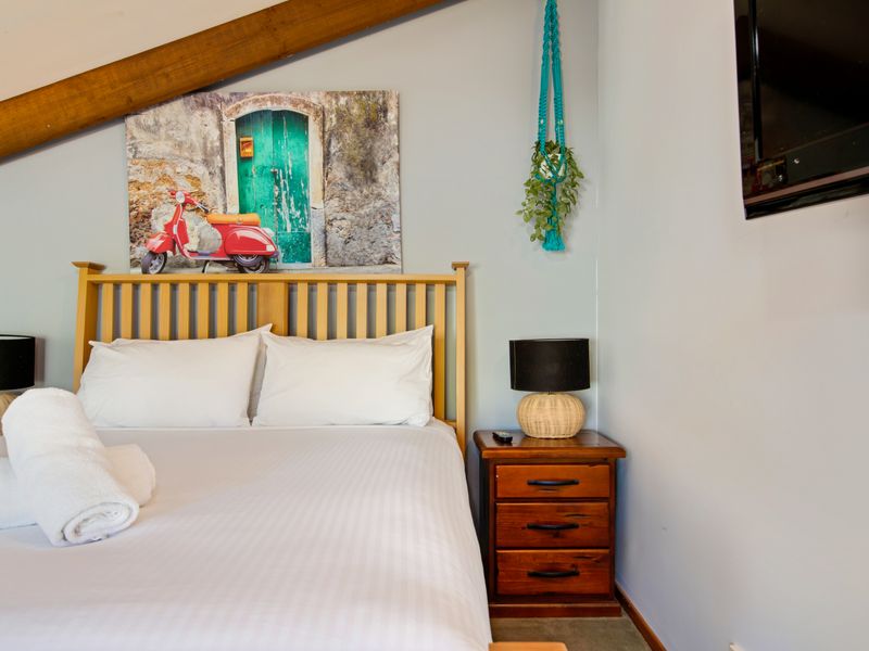 Well-presented bedroom with a warm and welcoming feel.