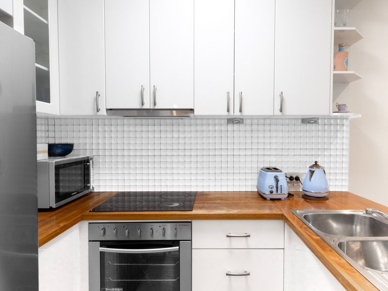 Modern kitchen with stainless-steel appliances