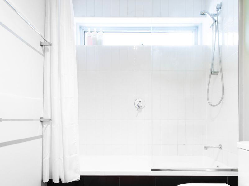Refresh in the sparkling clean bathroom with walk-in shower.