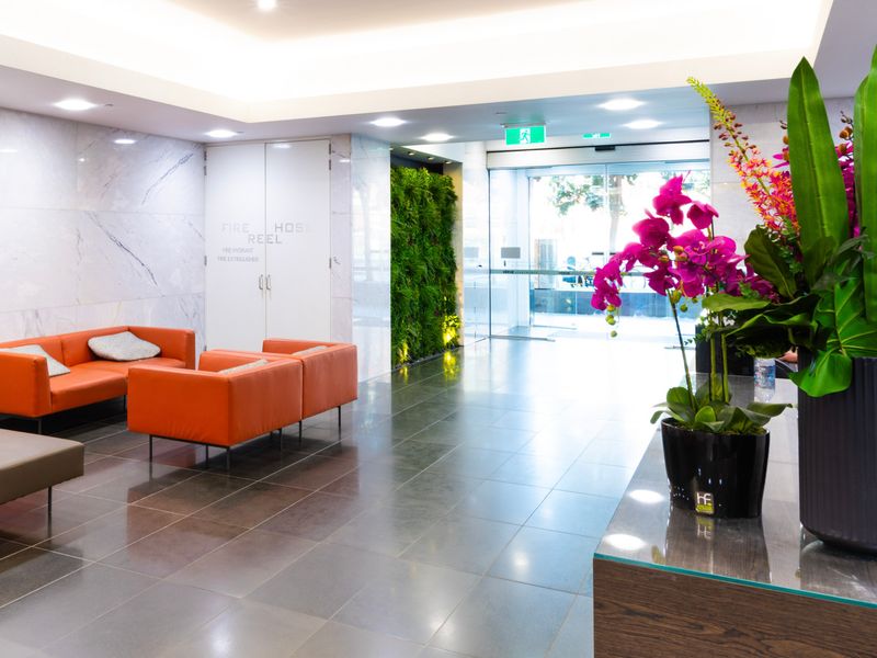 Welcoming building lobby with modern seating and décor.