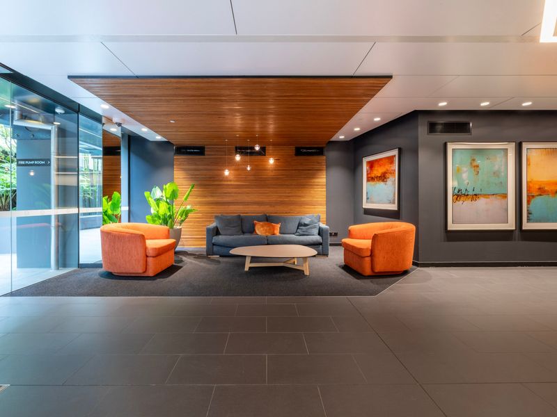 Welcoming lobby with seating area and modern finishes