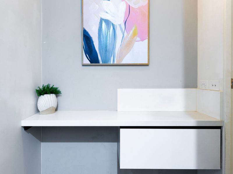 Minimalist workspace with wall art and bright décor