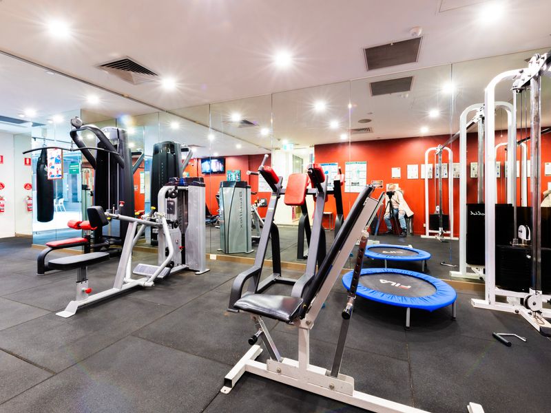 Gym with fitness equipment and weights