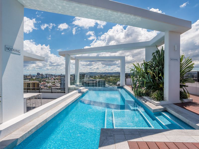 Take a refreshing dip in the rooftop infinity-edge pool.