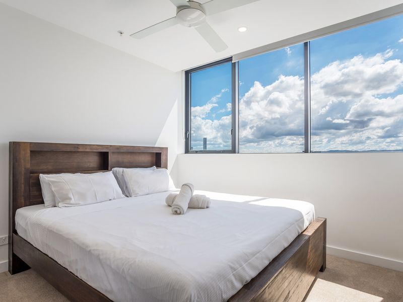 Stylish and inviting main bedroom for a restful stay.