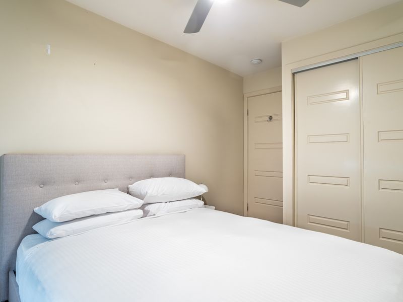 Queen bedroom with built-in storage