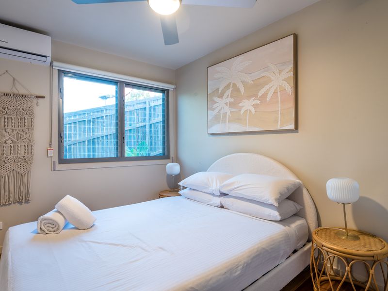 Comfortable guest room with serene tones