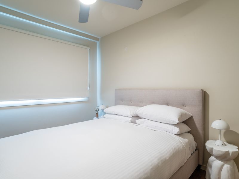 Bedroom with bedside lighting