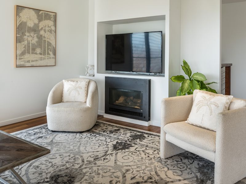 Warm living area with cozy fireplace