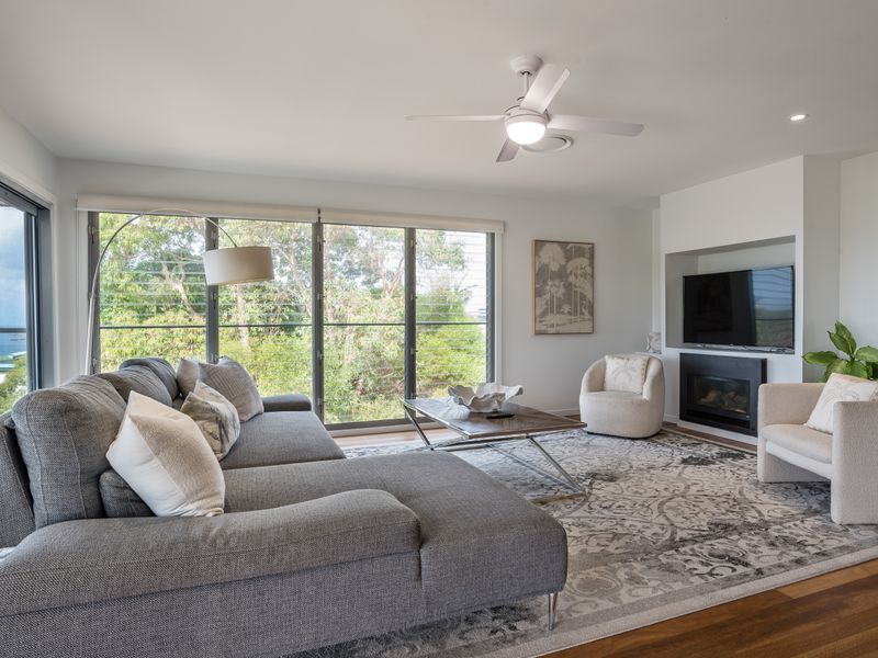 Sunny lounge with leafy views