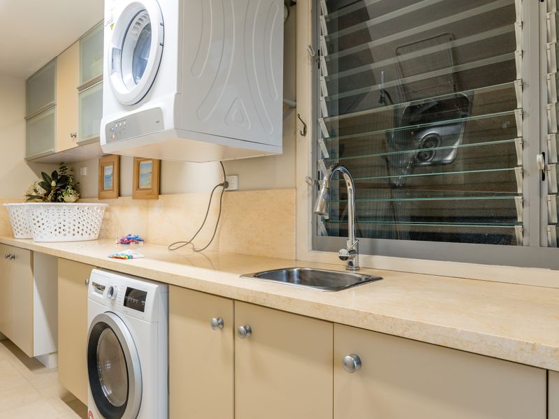 Handy laundry with washer and sink