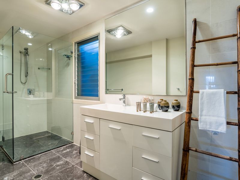 Sleek bathroom with glass shower