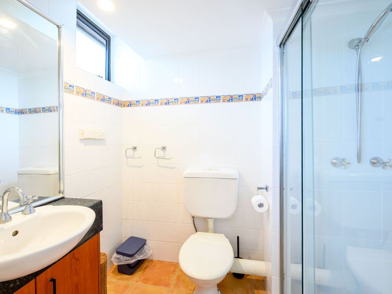 Clean and modern bathroom with walk-in shower