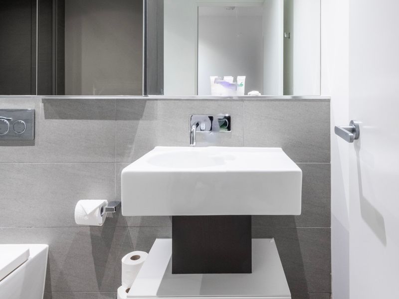 Clean and modern bathroom with bright finishes