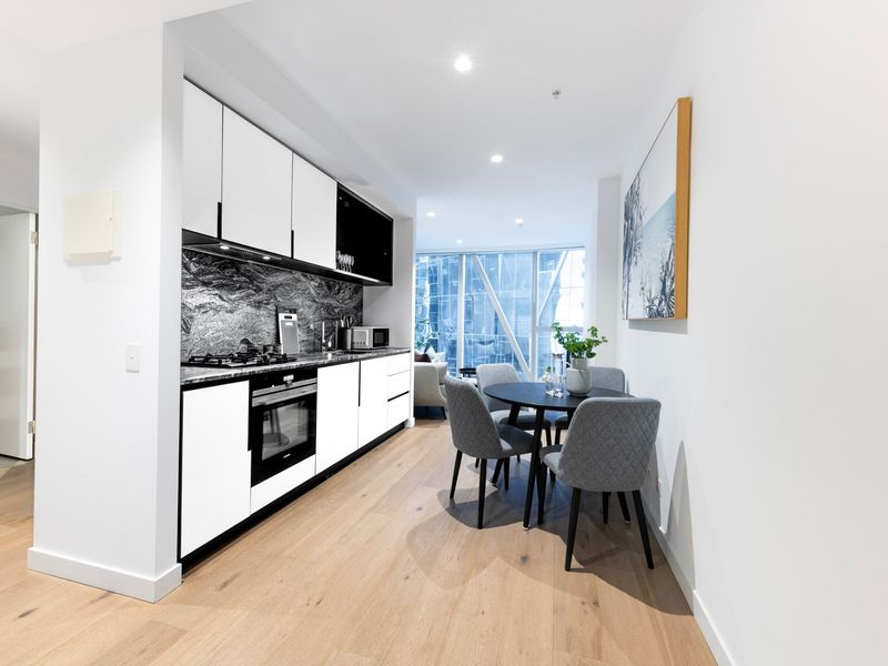 Fully equipped kitchen featuring sleek finishes