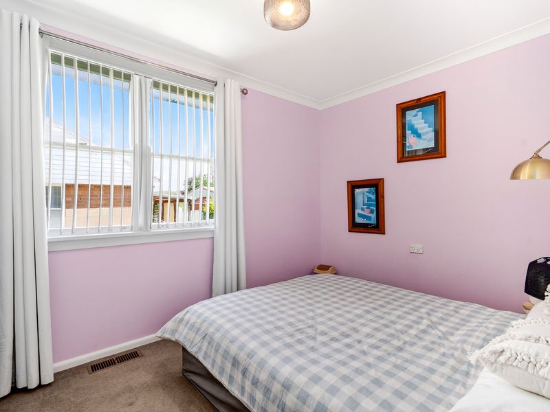 Peaceful bedroom with soft pastel tones for a restful sleep