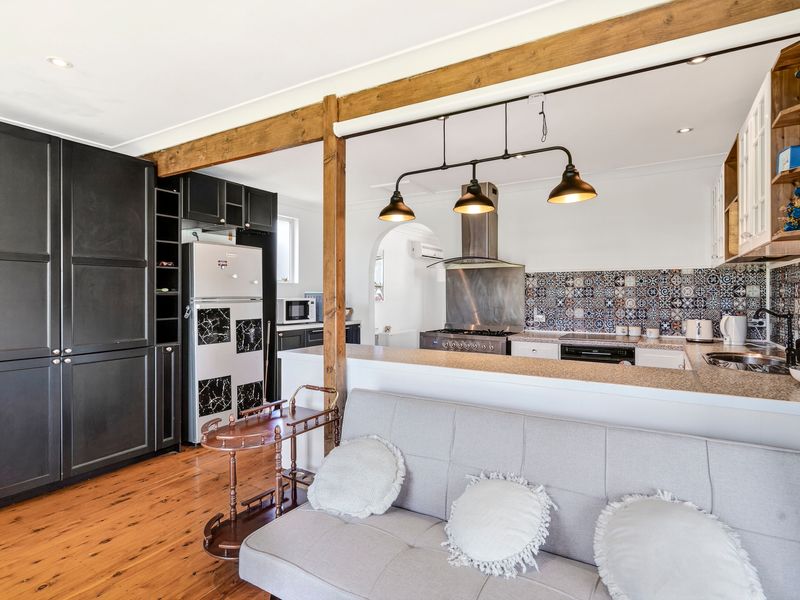 Open dining area connected to the kitchen, ideal for shared meals