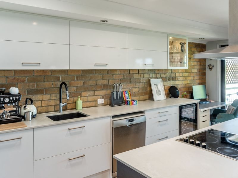 Kitchen detail highlighting generous bench space and modern finishes