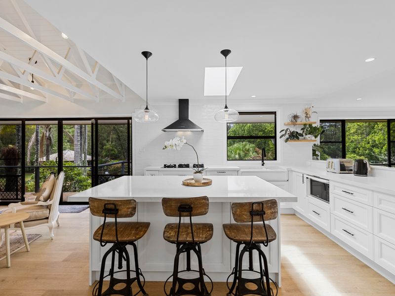 Chef’s kitchen with large island and breakfast seating