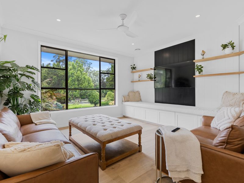 Relaxed lounge with smart TV and garden outlook