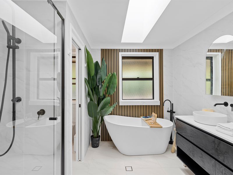 Luxury bathroom with freestanding tub and walk-in shower