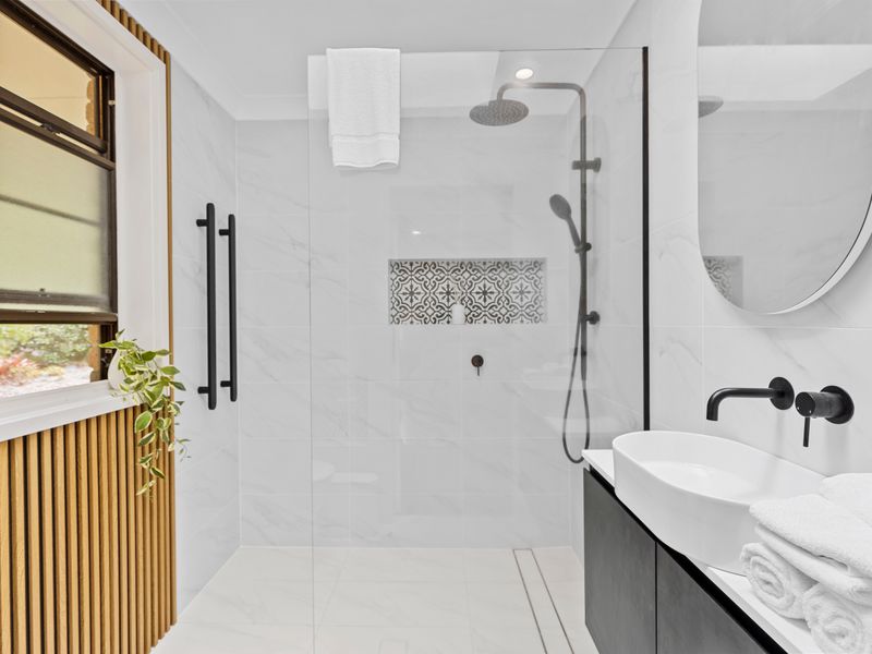 Contemporary bathroom with spacious rainfall shower