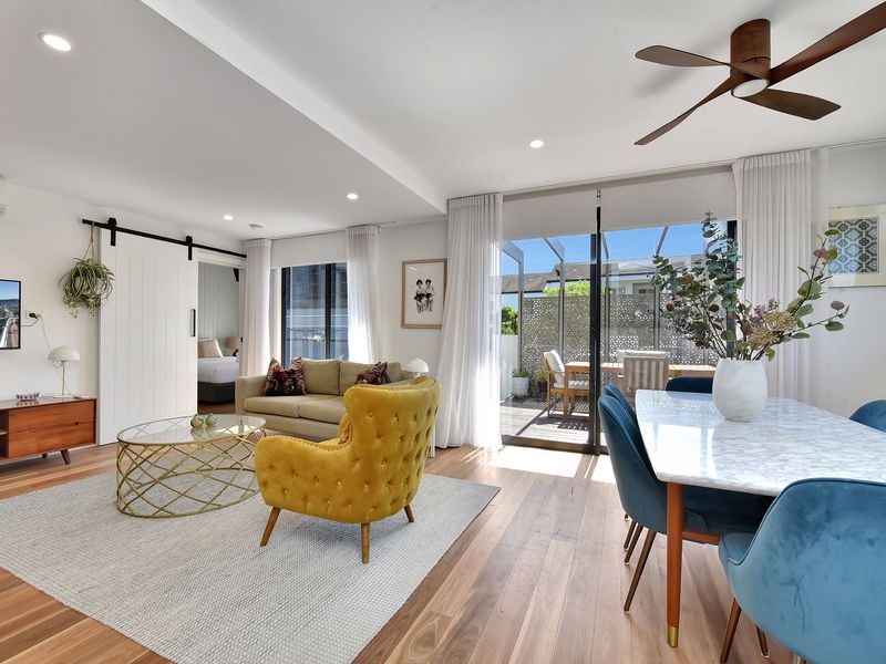 Spacious lounge and dining area with outdoor access