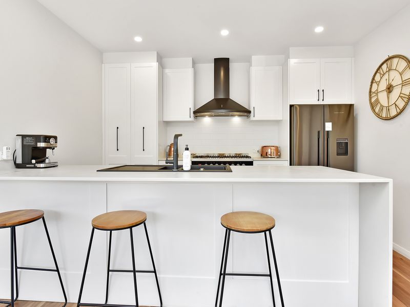 Modern kitchen with breakfast bar seating