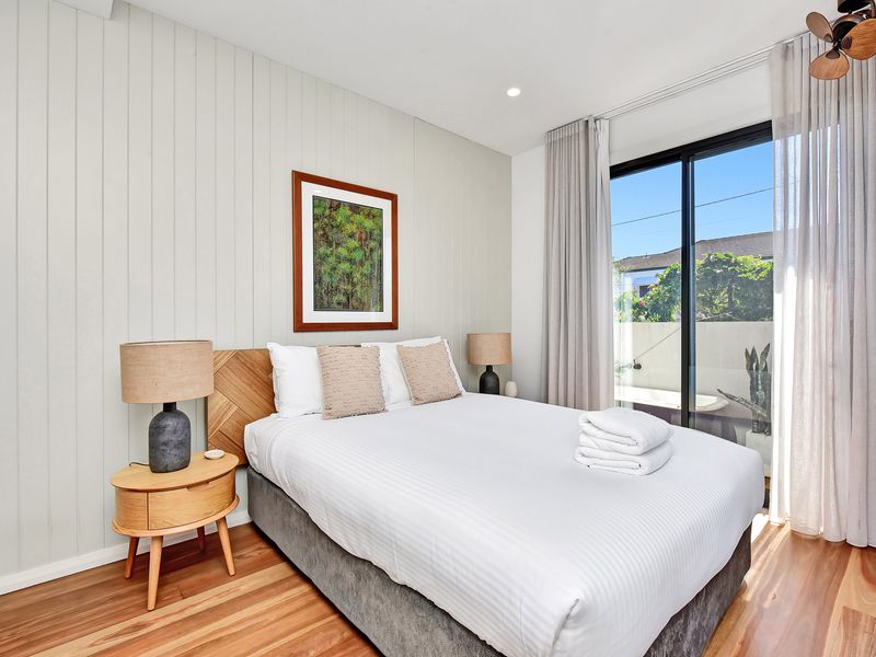 Comfortable bedroom with balcony views