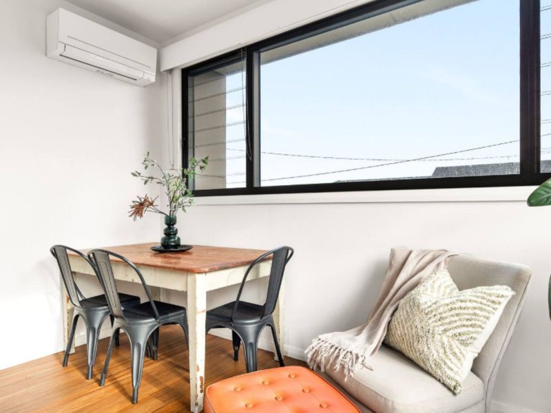 Compact dining nook with window views