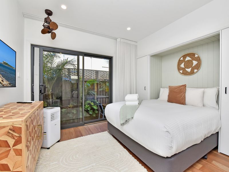 Bright bedroom with garden views and easy outdoor access