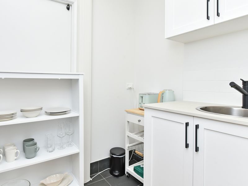 Compact kitchenette with essentials for your stay