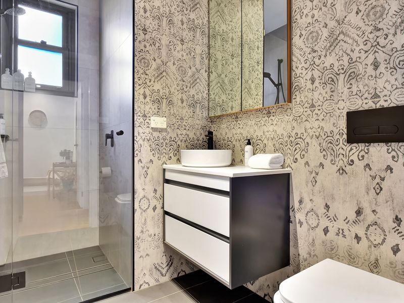 Modern bathroom with elegant patterned tiles